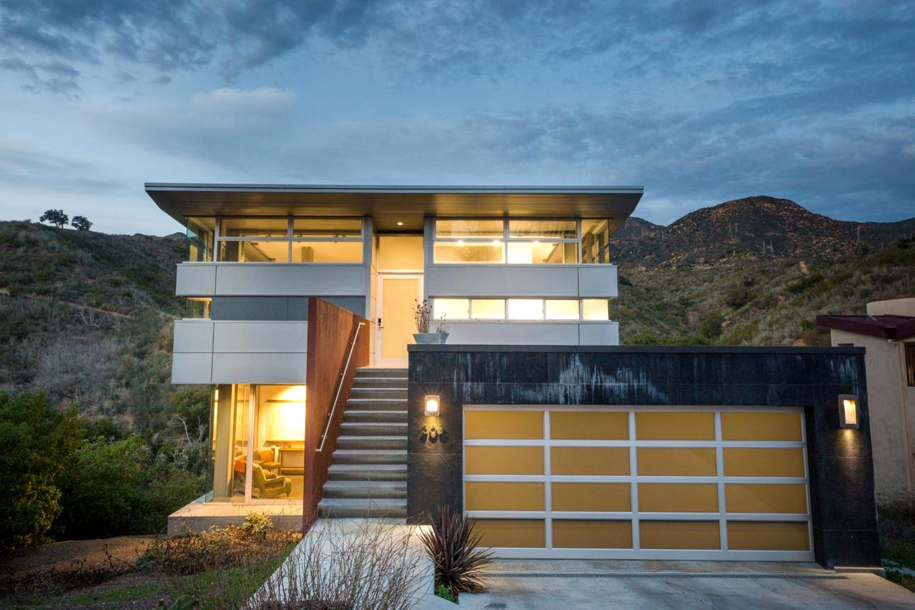 Modern fire-resistant hillside home in Malibu California after wildfire reconstruction